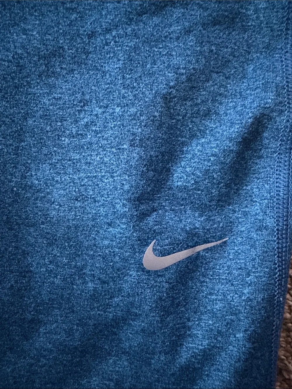 Nike Teal women’s cropped leggings